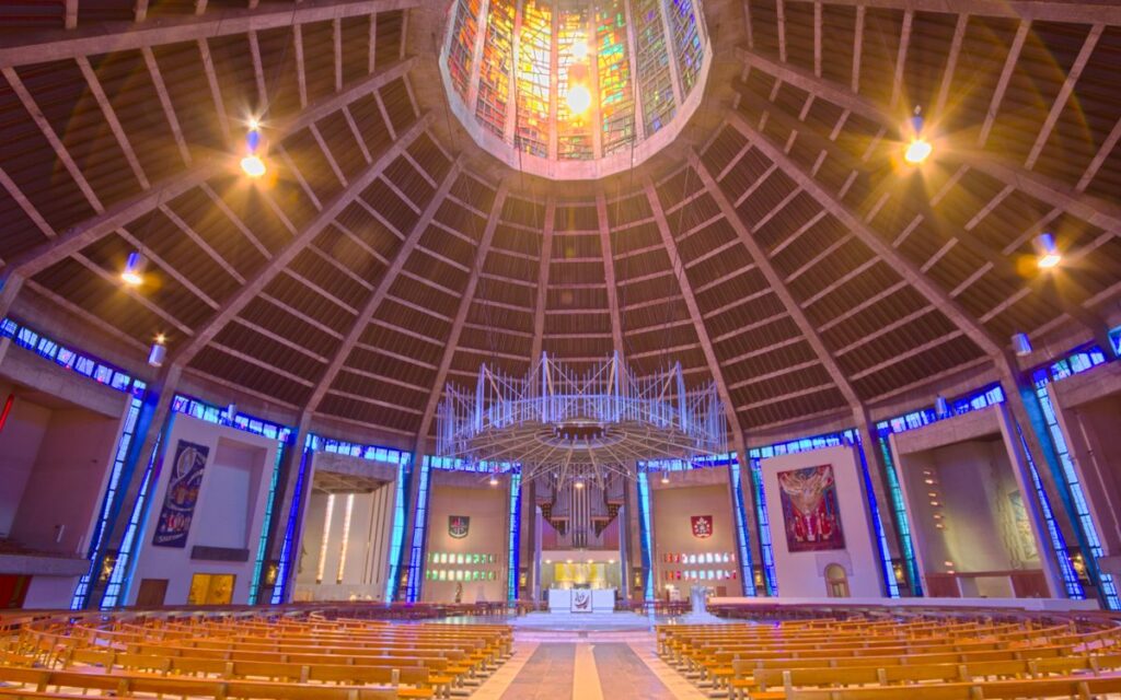 Explore the vibrant interior of Liverpool Metropolitan Cathedral with its stunning stained glass and architectural beaut